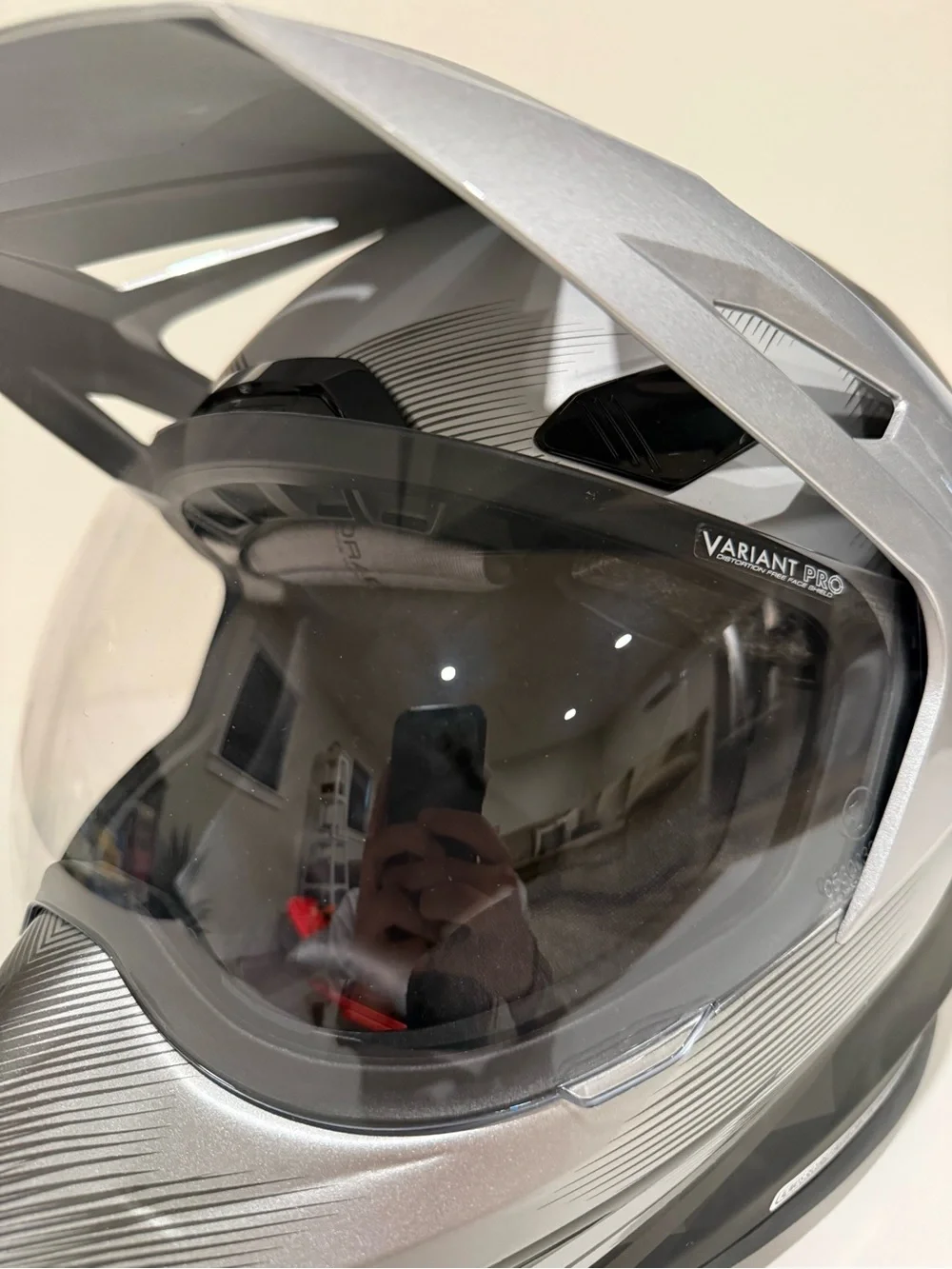 Icon Silver Dual-Purpose Motorcycle Helmet with Clear Visor